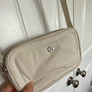 Cream lululemon camera bag